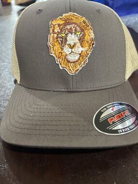Brown and Tan Trucker Hat with Embroidered Lion!